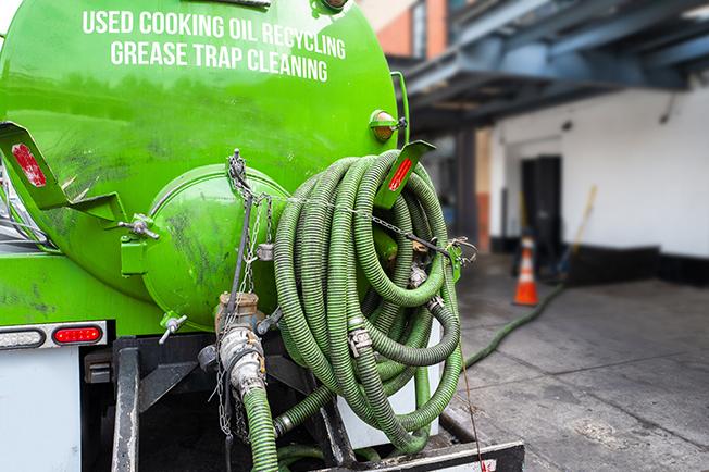 workers at Grease Trap Cleaning of Rome